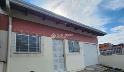Casa com 3 quartos à venda na Quarenta e Três, 53, Jardim Algarve, Alvorada, 123 m2 por R$ 349.900