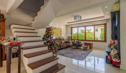Casa em condomínio fechado com 3 quartos à venda na Estrada João de Oliveira Remião, 1761, Agronomia, Porto Alegre, 241 m2 por R$ 849.000