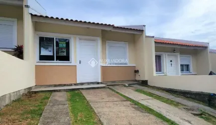 Casa em condomínio fechado com 2 quartos à venda na Rua Oscar Schick, 2350, Formoza, Alvorada, 66 m2 por R$ 255.000
