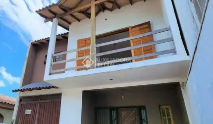 Casa com 3 quartos à venda na Avenida Zero Hora, 580, Jardim Algarve, Alvorada, 160 m2 por R$ 475.000
