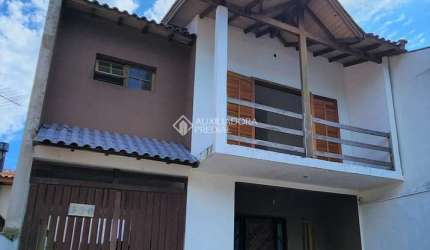 Casa com 3 quartos à venda na Avenida Zero Hora, 580, Jardim Algarve, Alvorada, 160 m2 por R$ 475.000