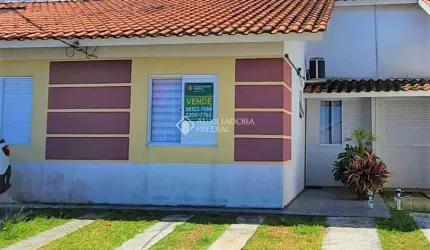 Casa em condomínio fechado com 3 quartos à venda na Acesso Terra Nova, 601, Terra Nova, Alvorada, 51 m2 por R$ 259.900