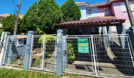 Casa com 3 quartos à venda na Rua Colibris, 328, Jardim Algarve, Alvorada, 95 m2 por R$ 279.900