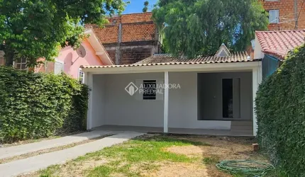 Casa com 3 quartos à venda na Rua Caturritas, 565, Jardim Algarve, Alvorada, 97 m2 por R$ 300.000
