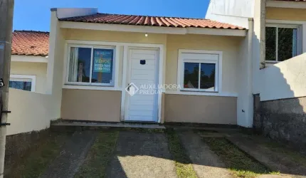 Casa em condomínio fechado com 2 quartos à venda na Rua Oscar Schick, 2350, Formoza, Alvorada, 66 m2 por R$ 200.000