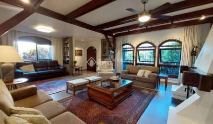 Casa em condomínio fechado com 3 quartos à venda na Rua Inhanduí, 252, Cristal, Porto Alegre, 309 m2 por R$ 1.600.000