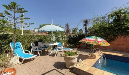 Casa com 4 quartos à venda na Rua Doutor Paulino Guerra, 575, Jardim Itu Sabará, Porto Alegre, 345 m2 por R$ 1.300.000