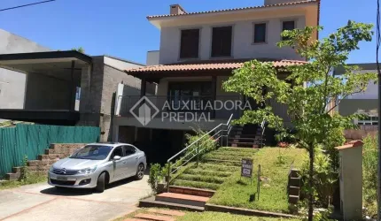 Casa em condomínio fechado com 3 quartos à venda na Avenida Senador Salgado Filho, 8501, Jardim Krahe, Viamão, 234 m2 por R$ 1.856.000