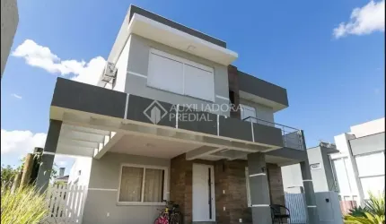 Casa em condomínio fechado com 3 quartos à venda na Avenida Senador Salgado Filho, 8500, Querência, Viamão, 210 m2 por R$ 1.600.000