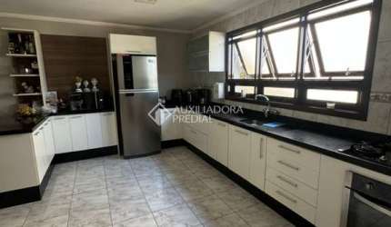 Casa com 3 quartos à venda na Rua Elvira Cruz Netto, 131, De Lazzer, Caxias do Sul, 223 m2 por R$ 980.000