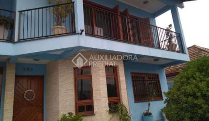 Casa em condomínio fechado com 5 quartos à venda na DOUTOR JOSE MONTAURY, 530, Centro, Guaíba, 720 m2 por R$ 1.790.000