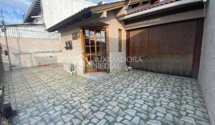 Casa em condomínio fechado com 2 quartos à venda na Rua César Passarinho, 115, Jardim dos Lagos, Guaíba, 124 m2 por R$ 450.000