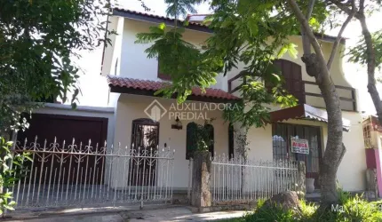 Casa em condomínio fechado com 4 quartos à venda na Rua Sergipe, 242, Parque 35, Guaíba, 300 m2 por R$ 659.000