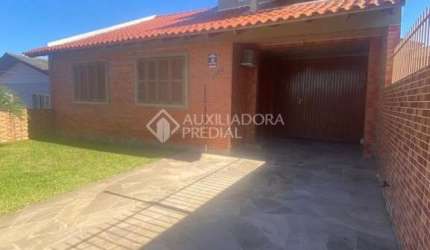 Casa em condomínio fechado com 3 quartos à venda na Rua Coronel Inácio de Quadros, 1171, Coronel Nassuca, Guaíba, 230 m2 por R$ 430.000