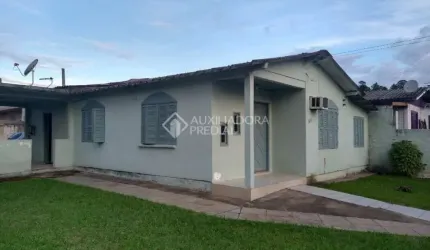 Casa em condomínio fechado com 3 quartos à venda na DAVID RIOS PINTO   ANTIGA B2, 304, Morada da Colina, Guaíba, 116 m2 por R$ 300.000