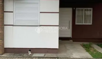 Casa em condomínio fechado com 2 quartos à venda na Rua Ricardo Bandeira Bressani, 120, Jardim dos Lagos, Guaíba, 47 m2 por R$ 196.000