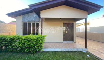 Casa em condomínio fechado com 3 quartos à venda na OSVALDO POETA, 57, Centro, Guaíba, 127 m2 por R$ 450.000