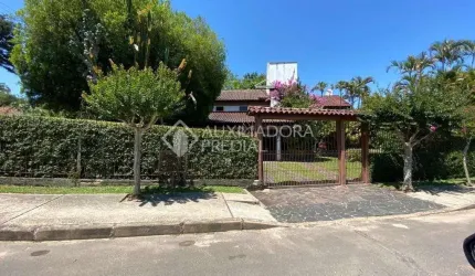 Casa em condomínio fechado com 4 quartos à venda na Avenida Florida, 290, Flórida, Guaíba, 500 m2 por R$ 1.500.000