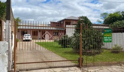 Casa com 3 quartos à venda na Rua Arnaldo Tolotti, 23, Centro, Guaíba, 143 m2 por R$ 570.000
