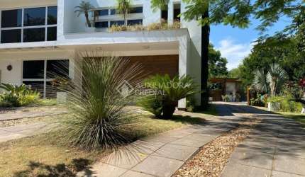 Casa em condomínio fechado com 4 quartos à venda na BORREGARD, 355, Alegria, Guaíba, 400 m2 por R$ 1.990.000