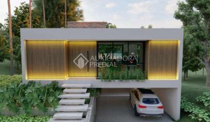 Casa em condomínio fechado com 3 quartos à venda na Avenida Dona Frutuosa, 1000, Coronel Nassuca, Guaíba, 250 m2 por R$ 1.267.000