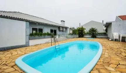 Casa em condomínio fechado com 3 quartos à venda na Rua República, 2050, Harmonia, Canoas, 86 m2 por R$ 900.100