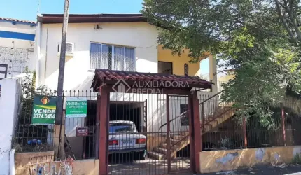 Casa em condomínio fechado com 3 quartos à venda na Rua Barão do Ladário, 45, São José, Canoas, 277 m2 por R$ 424.000