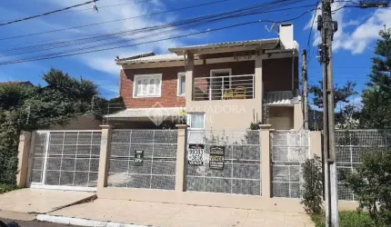 Casa em condomínio fechado com 3 quartos à venda na Rua das Timbaúvas, 76, Igara, Canoas, 280 m2 por R$ 1.600.000