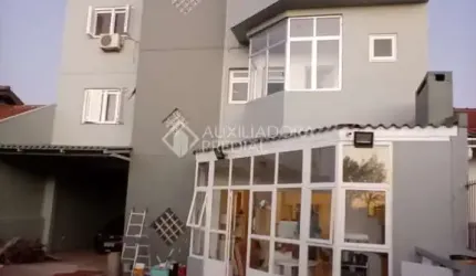 Casa em condomínio fechado com 4 quartos à venda na Rua Doutor João César Krieger, 127, Rubem Berta, Porto Alegre, 468 m2 por R$ 1.100.000