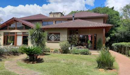 Casa em condomínio fechado com 6 quartos à venda na Via Do Sol Poente, 546, Girassol, Gravataí, 400 m2 por R$ 1.750.000