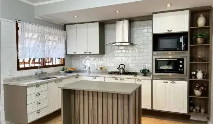 Casa com 3 quartos à venda na Rua Turquia, 18, Marechal Rondon, Canoas, 255 m2 por R$ 1.170.000