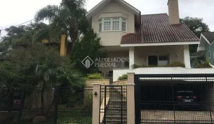 Casa em condomínio fechado com 3 quartos à venda na Rua Cangerana, 660, São Lucas, Viamão, 222 m2 por R$ 1.100.000