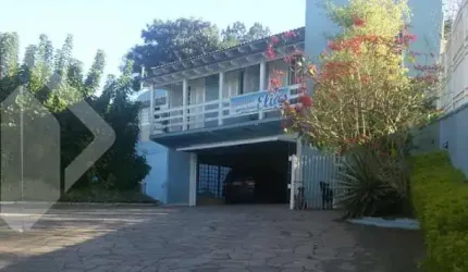 Casa em condomínio fechado com 4 quartos à venda na Avenida João Carlos Viale Dias, 1347, Tarumã, Viamão, 333 m2 por R$ 2.180.000