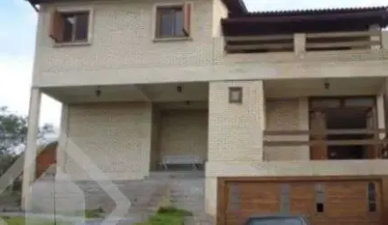 Casa em condomínio fechado com 3 quartos à venda na Estrada Capitão Gentil Machado de Godoy, 4500, Vila Elsa, Viamão, 400 m2 por R$ 1.300.000