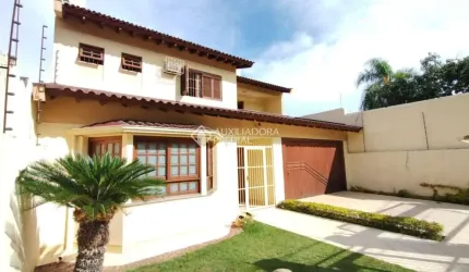 Casa com 4 quartos à venda na Rua Alfredo Silveira Dias, 15, Nonoai, Porto Alegre, 350 m2 por R$ 1.080.000