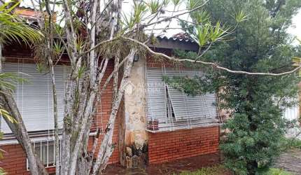 Casa com 3 quartos à venda na Rua Rossini, 75, São Sebastião, Porto Alegre, 144 m2 por R$ 750.000