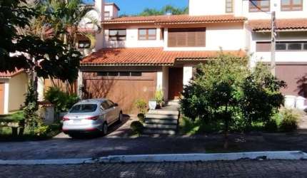 Casa em condomínio fechado com 4 quartos à venda na Rua Fernando Osório, 90, Teresópolis, Porto Alegre, 195 m2 por R$ 1.350.000