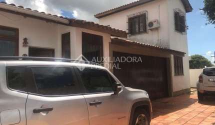 Casa em condomínio fechado com 5 quartos à venda na Rua André Pitthan, 80, Coronel Aparício Borges, Porto Alegre, 280 m2 por R$ 550.000