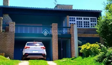 Casa em condomínio fechado com 4 quartos à venda na Rua dos Guananas, 290, Espírito Santo, Porto Alegre, 200 m2 por R$ 585.000