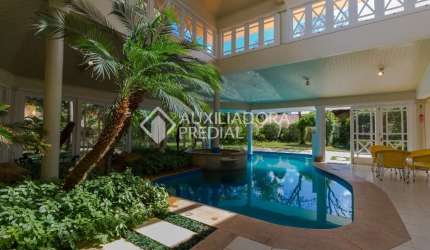 Casa em condomínio fechado com 4 quartos à venda na Avenida da Cavalhada, 5205, Cavalhada, Porto Alegre, 927 m2 por R$ 6.000.000