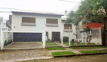 Casa em condomínio fechado com 4 quartos à venda na Rua Bororó, 225, Vila Assunção, Porto Alegre, 564 m2 por R$ 1.940.000