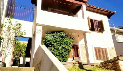 Casa com 3 quartos à venda na Rua Tomaz Edison, 426, Santo Antônio, Porto Alegre, 140 m2 por R$ 362.000