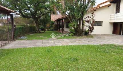 Casa com 5 quartos à venda na Rua Engenheiro Jorge Porto, 211, Ipanema, Porto Alegre, 950 m2 por R$ 1.900.000