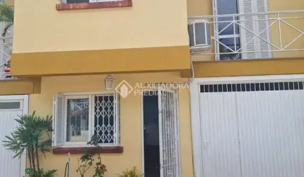 Casa em condomínio fechado com 3 quartos à venda na BARBOSA NETO, 205, Cavalhada, Porto Alegre, 129 m2 por R$ 570.000