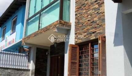 Casa com 3 quartos à venda na Rua Dona Firmina, 143, Vila São José, Porto Alegre, 165 m2 por R$ 680.000