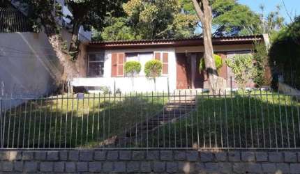 Casa com 3 quartos à venda na Rua Pedro Chaves Barcelos, 302, Auxiliadora, Porto Alegre, 387 m2 por R$ 1.100.000
