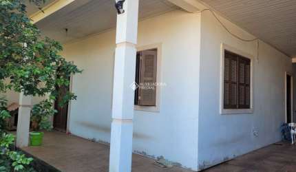 Casa em condomínio fechado com 3 quartos à venda na Rua Guia Lopes, 341, Jardim do Cedro, Gravataí, 198 m2 por R$ 250.000