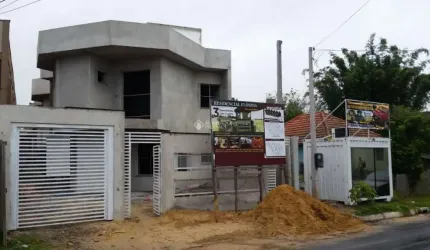 Casa em condomínio fechado com 3 quartos à venda na Rua Buttenbender, 296, Fátima, Canoas, 147 m2 por R$ 469.900