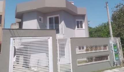 Casa em condomínio fechado com 3 quartos à venda na Rua Buttenbender, 296, Fátima, Canoas, 130 m2 por R$ 499.900