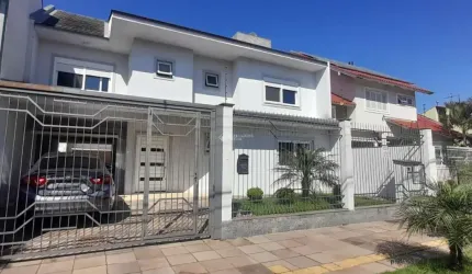 Casa com 4 quartos à venda na Rua Gardênia, 89, Estância Velha, Canoas, 250 m2 por R$ 1.600.000